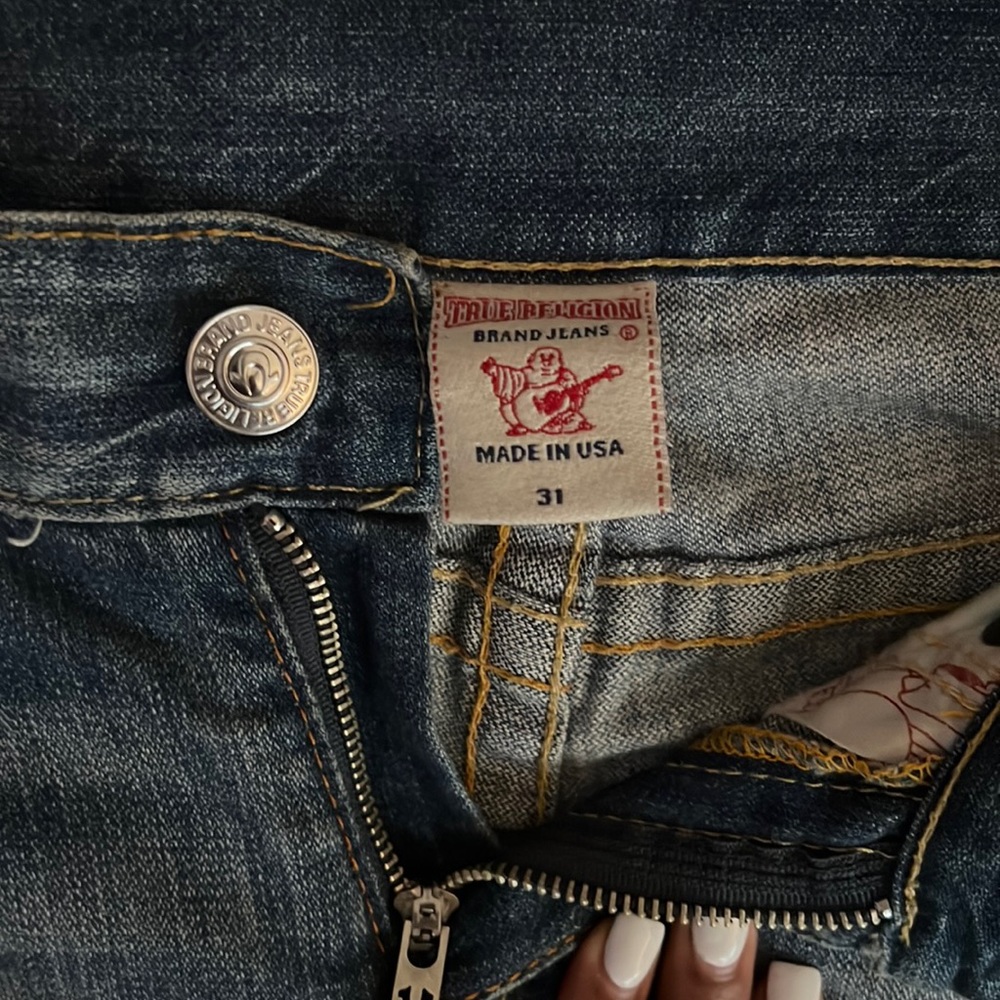 RIPPED TRUE RELIGION JEANS